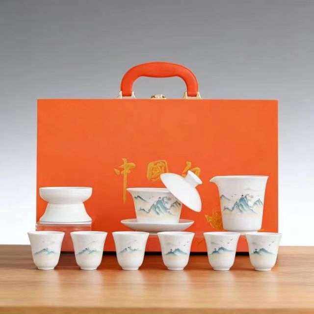 High-End White Porcelain Tea Set with a Landscape Design, Complete with a Gaiwan, Ceramic Gift Box, and Souvenirs
