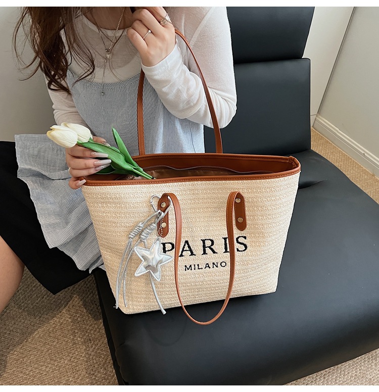 Summer striped woven large-capacity tote bag 2025 New style fashionable and trendy Korean style simple and elegant casual single-shoulder bag undefined