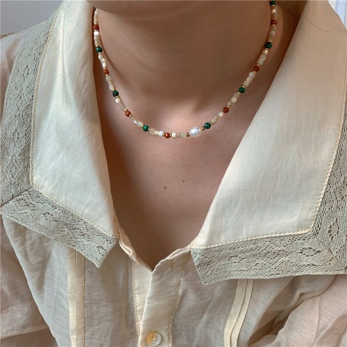Titanium steel milk tea color freshwater pearl necklace with colored beads, abalone lockchain, layered for a stylish and trendy look.