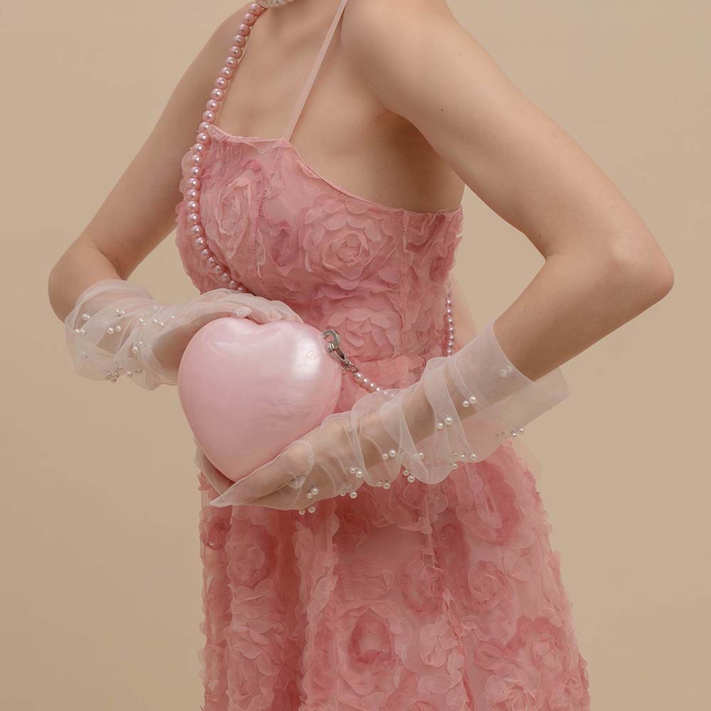 Elegante borsa a mano in acrilico trasparente con cuore pochette sera_voghion.com