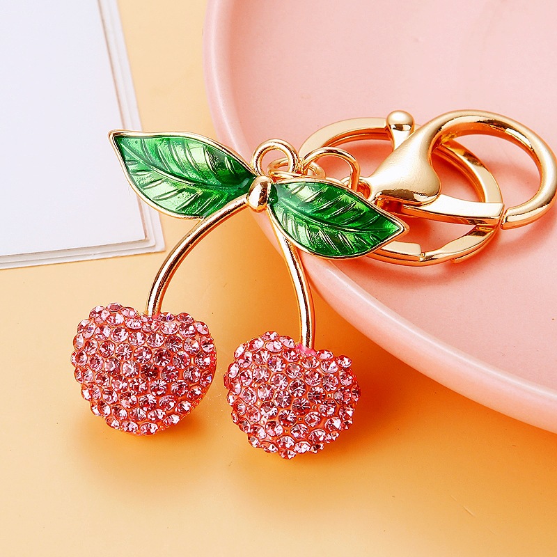 Creativo lindo diamante fruta pequeño limón llavero del coche bolso de las mujeres colgante de metal llavero anillo de regalo de dibujos animados