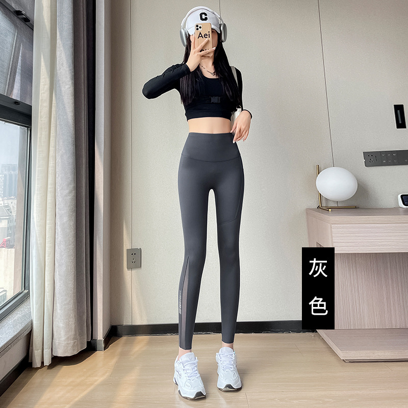 Pantalones de tiburón 2023 nuevo verano de las mujeres delgadas desgaste exterior de malla de bolsillo de primavera y otoño fitness bottoming yoga Barbie Pantalones