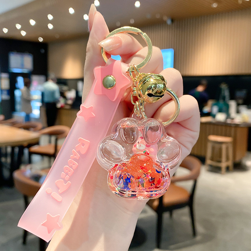 Linda bolsa de fresa de aceite llavero de conejo exquisito colgante de botella de deriva colgante de bolsa de coche colgante pequeño regalo al por mayor