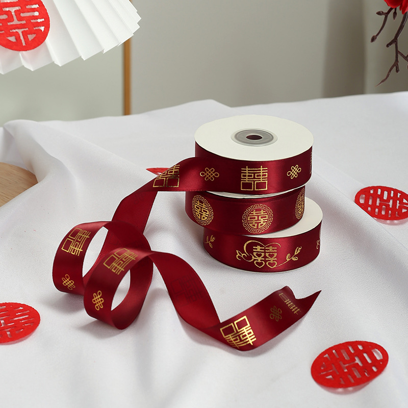 Red silk ribbon, auspicious character ribbon, colorful ribbon, wedding red satin ribbon, fluttering ribbon, festive wedding celebration gift, quilt binding ribbon, car interior decoration ribbon.