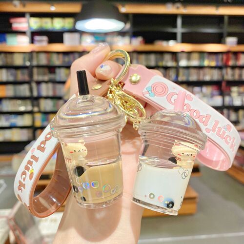 Internet celebrity cartoon oil floating pearl milk tea bear keychain female cute trendy car key chain school bag pendant