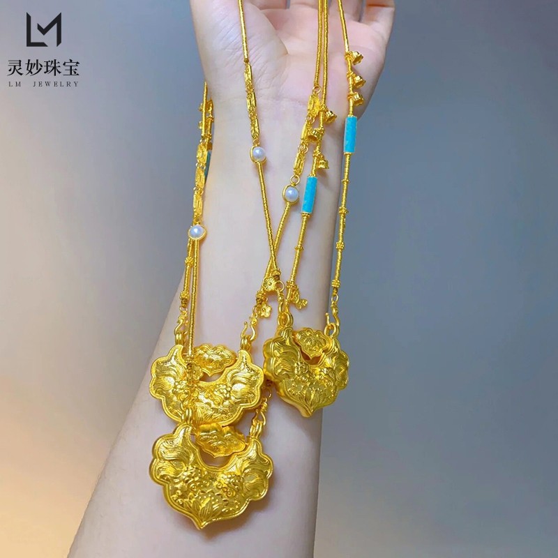 Gold shop same style ancient style carved double Fish Koi lock bag necklace female sand gold 999 safe gold lock pendant sweater chain