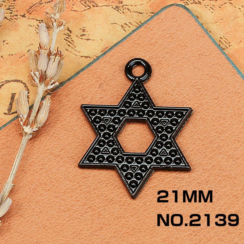 Aleación máscara cráneo electroforesis negro accesorios material al por mayor DIY colgante joyería Cruz alas negro colgante