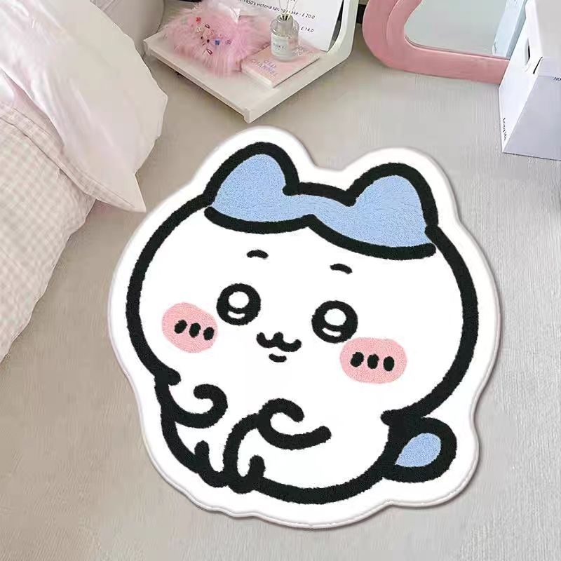 다리를 꼭 안고 앉아 있는 샤오바