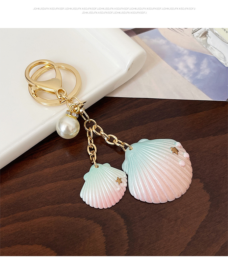 Cute Modern Style Alloy Resin Shell Women's Bag Pendant Keychain display picture 7