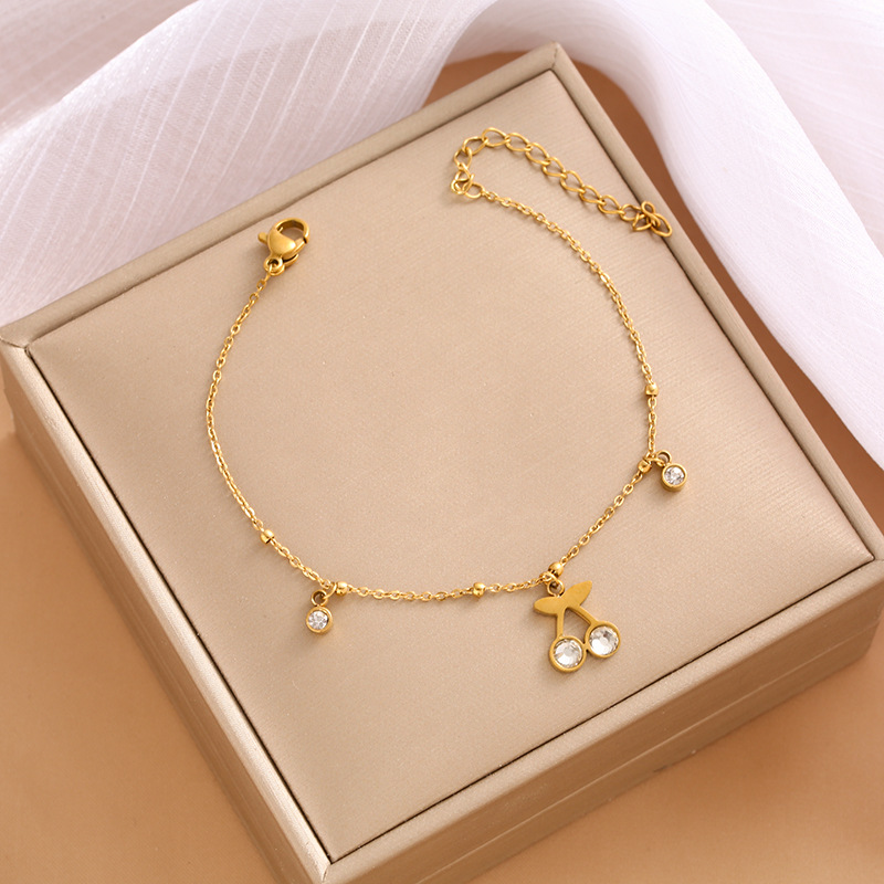 Pulsera de trébol de acero titanium vendedora caliente transfronteriza europea y americana con incrustaciones de concha pulsera colgante pulsera de diseño avanzado sin desvanecimiento al por mayor