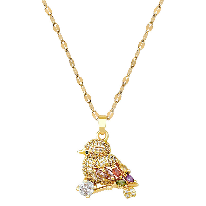 Collana con ciondolo a forma di uccello e zirconi oro_voghion.com