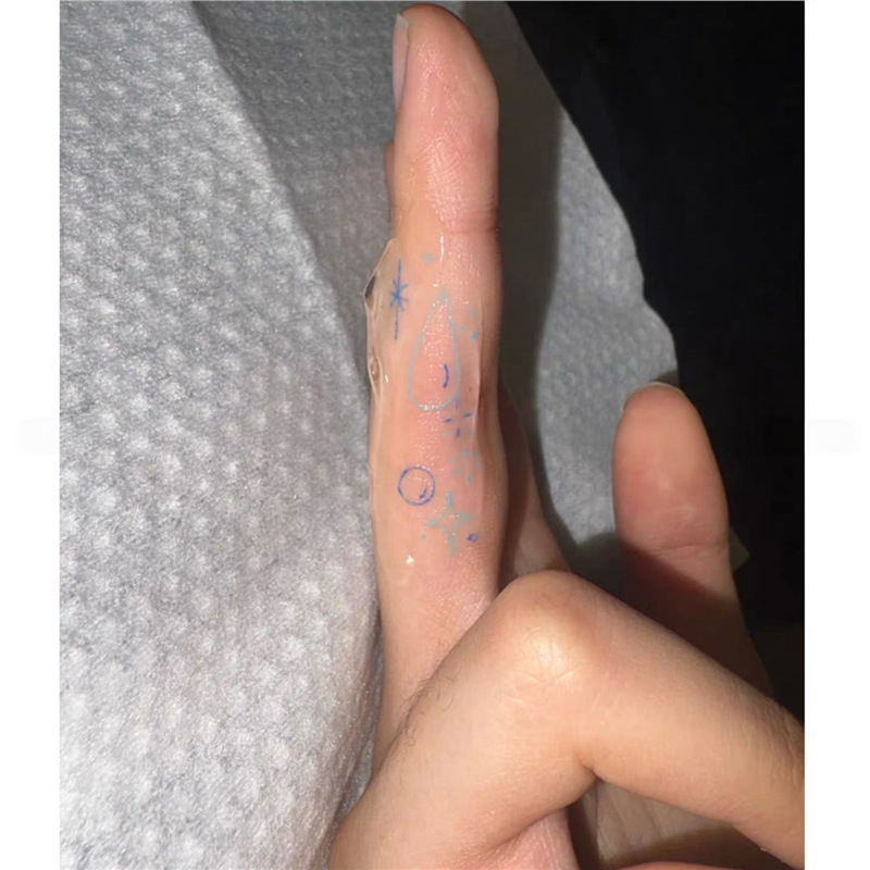 Small, fresh, blue and cyan star and raindrop colorful temporary tattoo stickers, waterproof, artistic, and trendy, perfect for decorating fingers Small, fresh, blue and cyan star and raindrop colorful temporary tattoo stickers, waterproof, artistic, and trendy, perfect for decorating fingers