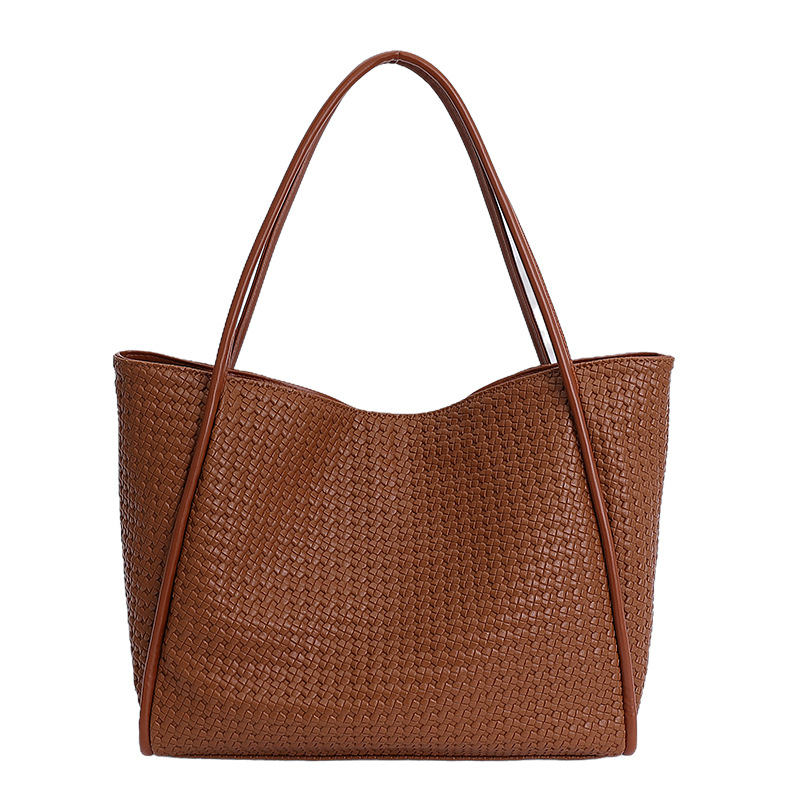 Bajo las axilas de gran capacidad para trabajar bolsas de viaje para mujeres nuevas moda coreana alta sensación de amplio ocio bolsas de hombro