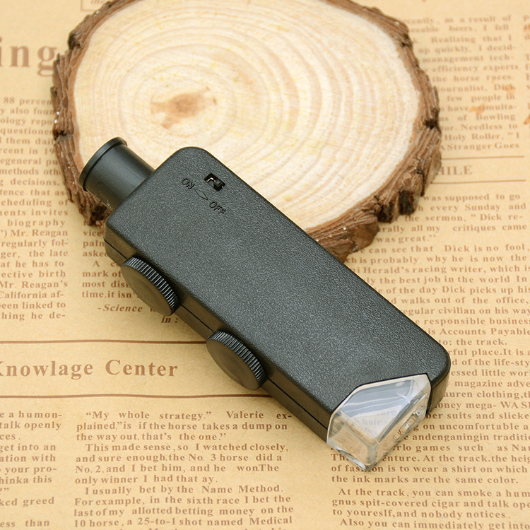 晶辉厂家60-100变倍10081-1带灯可调迷你便携袖珍显微镜放大镜