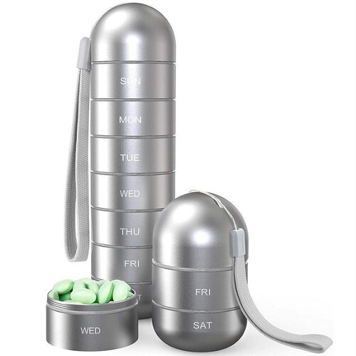 Metal portable pill box for one-week travel in Japan. Convenient sealed small medicine bottle storage portable medicine box for elderly people traveling in Japan.