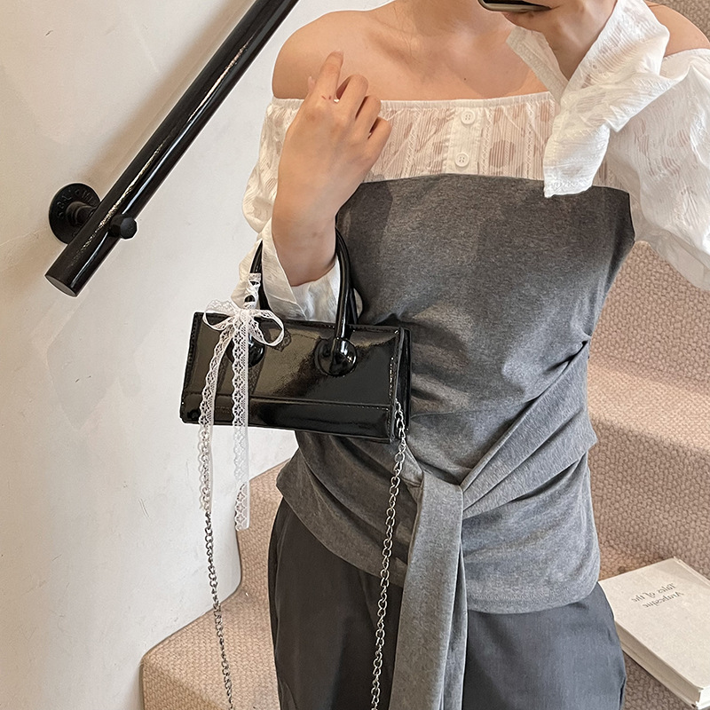 2025 verano venta caliente nuevo bolso cuadrado pequeño portátil moda todo fósforo bolso de mensajero de un solo hombro diseño de nicho bolso femenino de moda