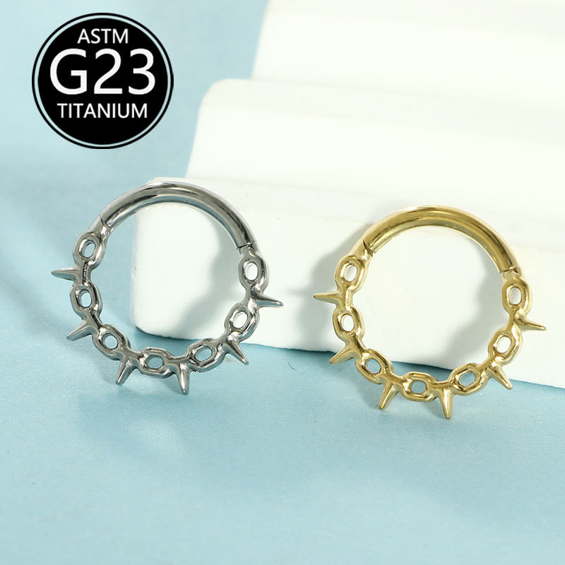 Silver pointed spike labret stud material detail