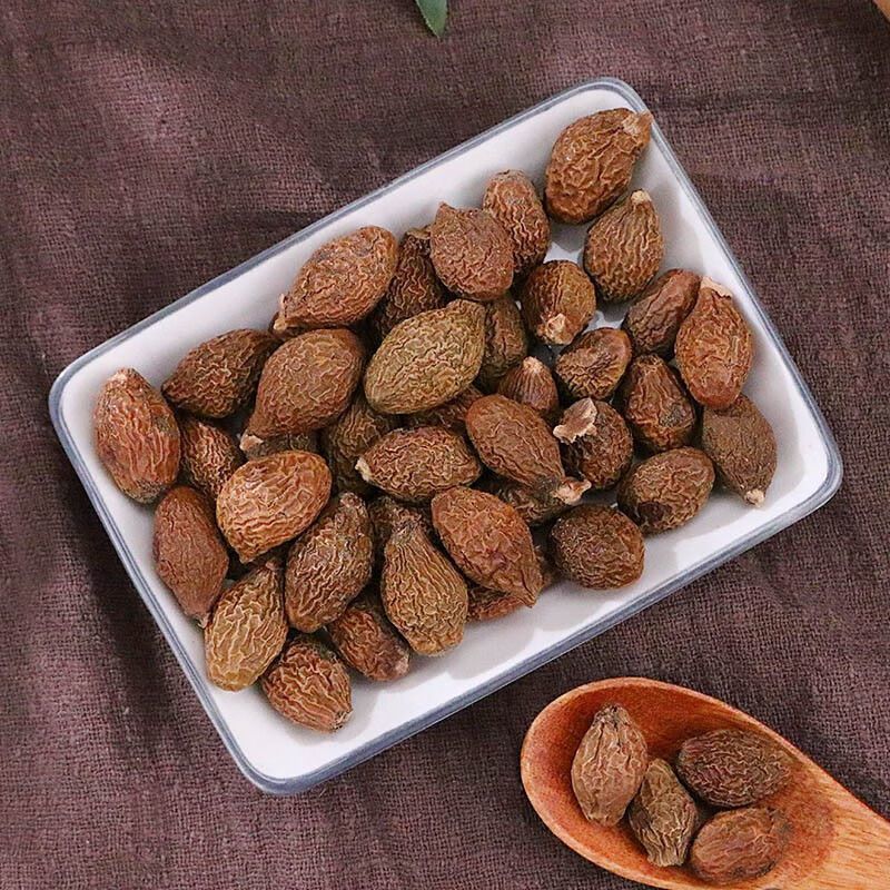 Fat Sea Seed Pang Da Hai Dried Herbal Fruit 50g Jar for Traditional Throat Tea in use