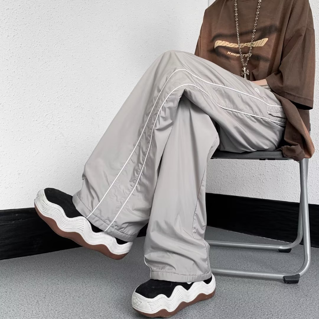 Pantalones funcionales americanos pantalones impermeables al aire libre hombres American High Street Vibe pantalones de pierna ancha de seda de hielo pantalones casuales a rayas