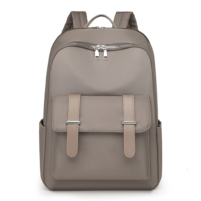 Comercio exterior al por mayor 2025 nueva mochila de nailon para mujer de color de contraste, mochila de computadora de gran capacidad anti-salpicaduras