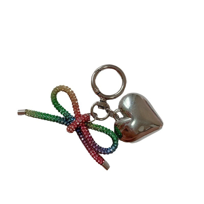 Small mobile phone with bow, pendant, diamond encrusted