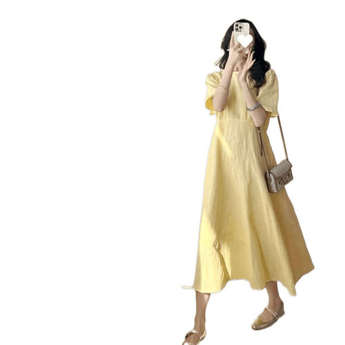 A charming French-style tea party dress for women that captivates at first glance, perfect for summer 2025 vacation fashion.