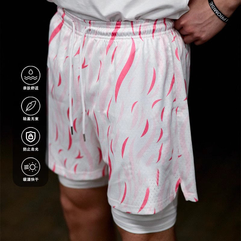Hombre de verano americano suelto pantalones cortos de secado rápido adolescente transpirables pantalones cortos de impresión de lanceta de hombre