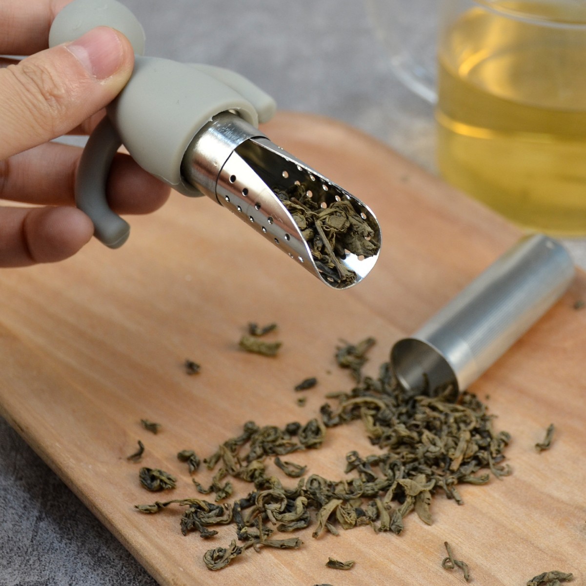 Colador de té creativo de acero inoxidable con cuchara de té colgando portátil de silicona en forma humana fabricante de té al por mayor lindo Filtro de té