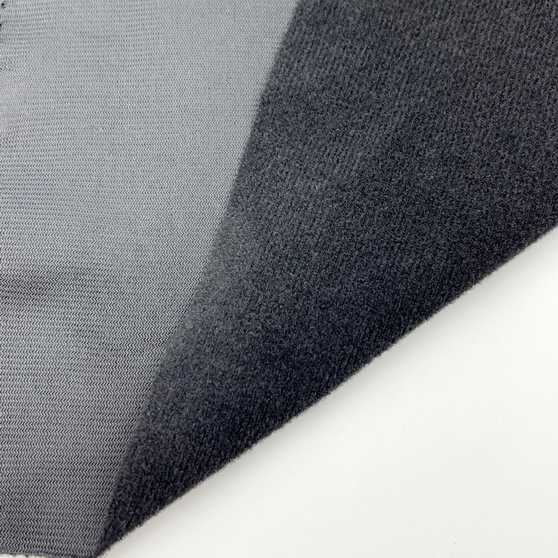 Tela de borde blanco y negro terciopelo tela cepillada poliéster bucle franela felpa juguete bolsa material del zapato tela