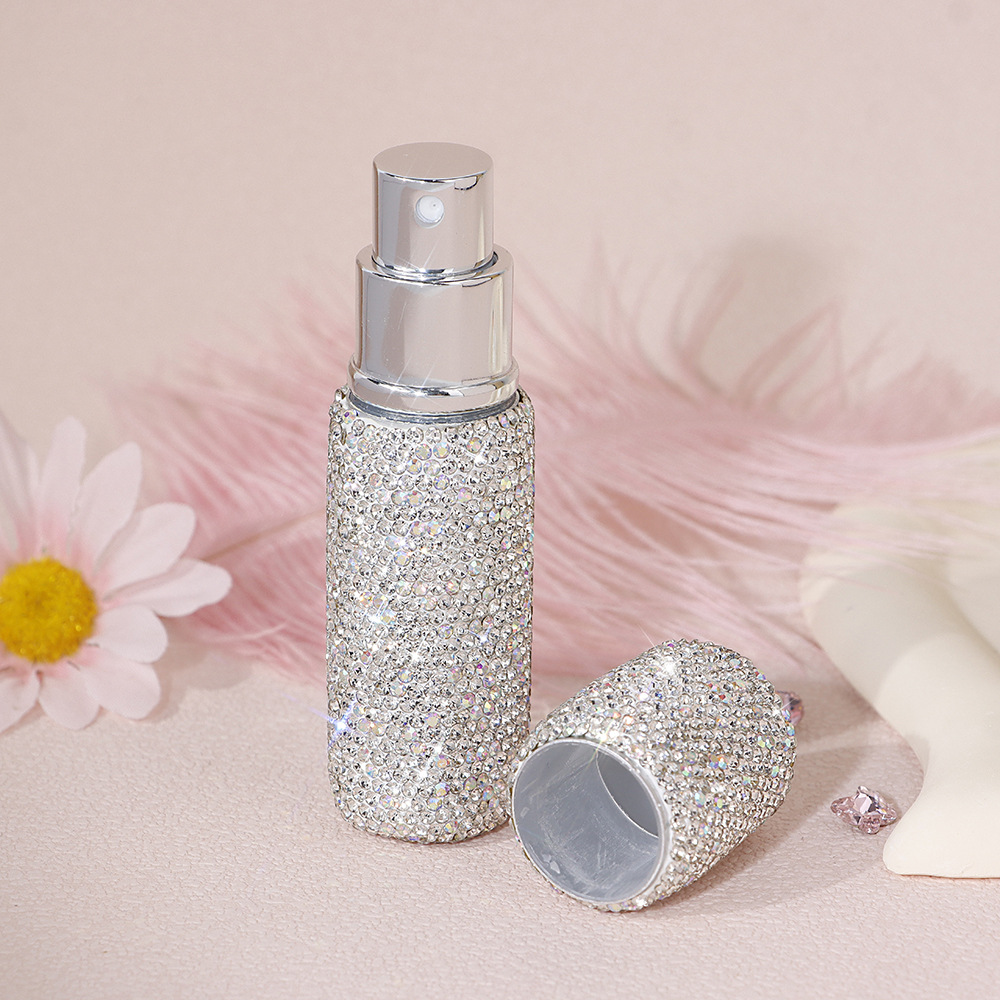 Botella de perfume de diamante blanco plateado botella de perfume de diamante botella de pulverización de vacío 10ml mini paquete portátil