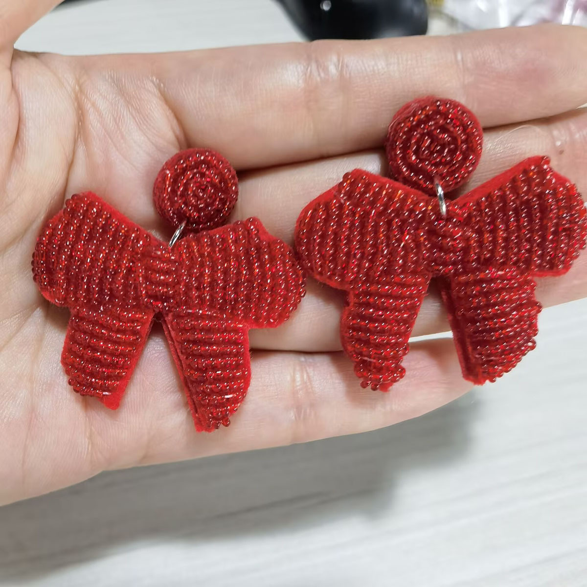 Woven design brand earrings handmade with bow