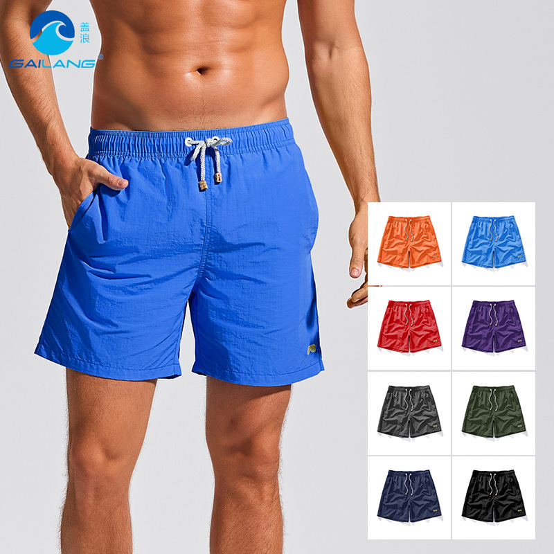 Beach pants men's sports seaside vacation swimming shorts loose size swimsuit with lining solid color a generation of hair