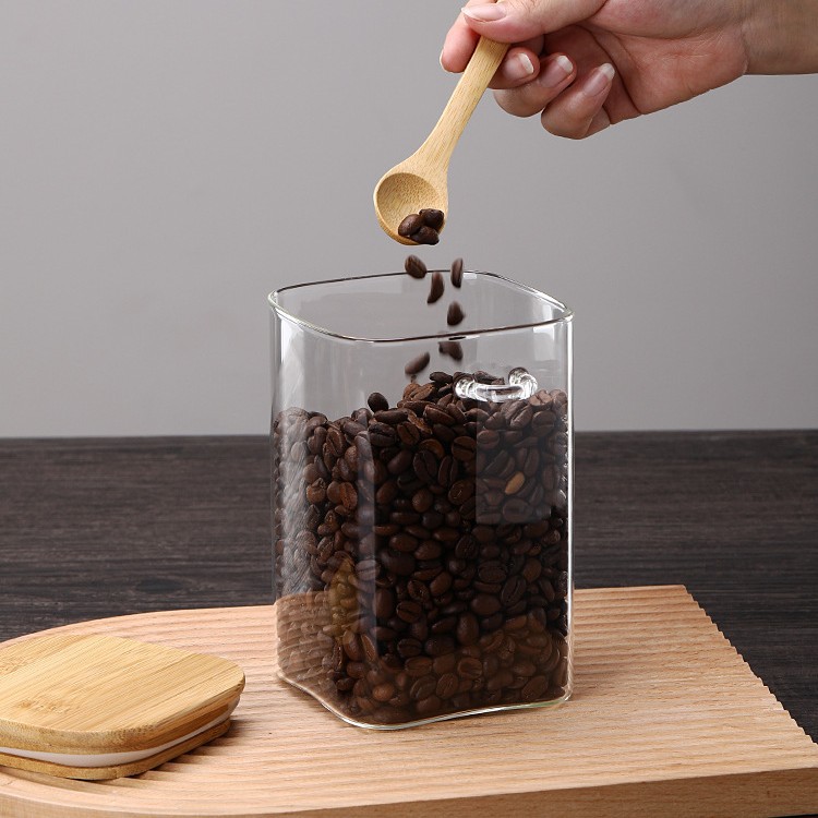 Tanque de almacenamiento de vidrio Juego de bocadillos de vidrio con botón a presión Tanque sellado Caja de almacenamiento sellada Tanque de almacenamiento de granos integrales