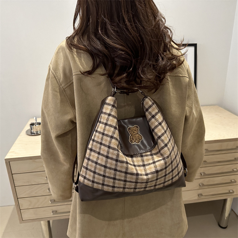 Casual lona tote para mujeres de gran capacidad 2024 nueva mochila multifuncional alta sensación de viaje de viajes de viaje mochila