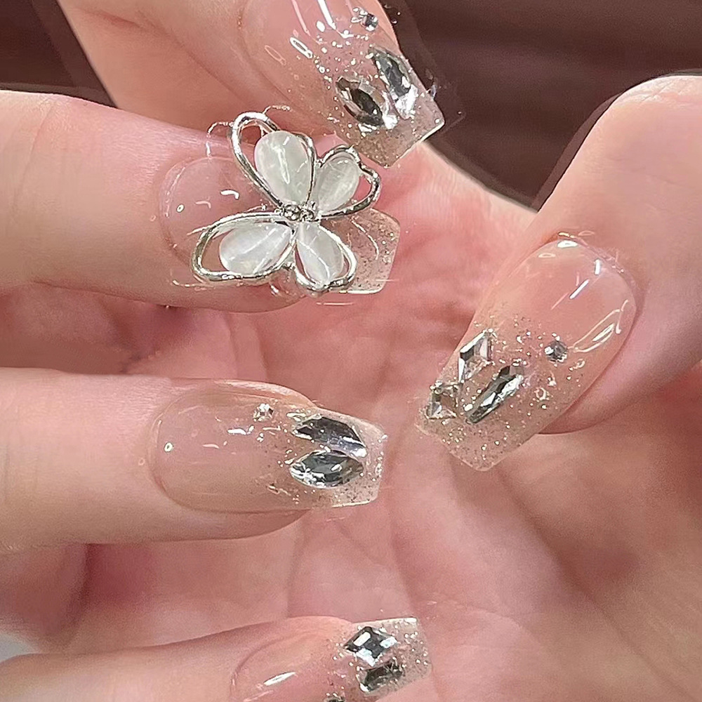 Uñas postizas de mariposa de moda en TikTok, estilo corto con pedrería y brillantina, pegatinas de uñas de lujo ligero para arte de uñas.