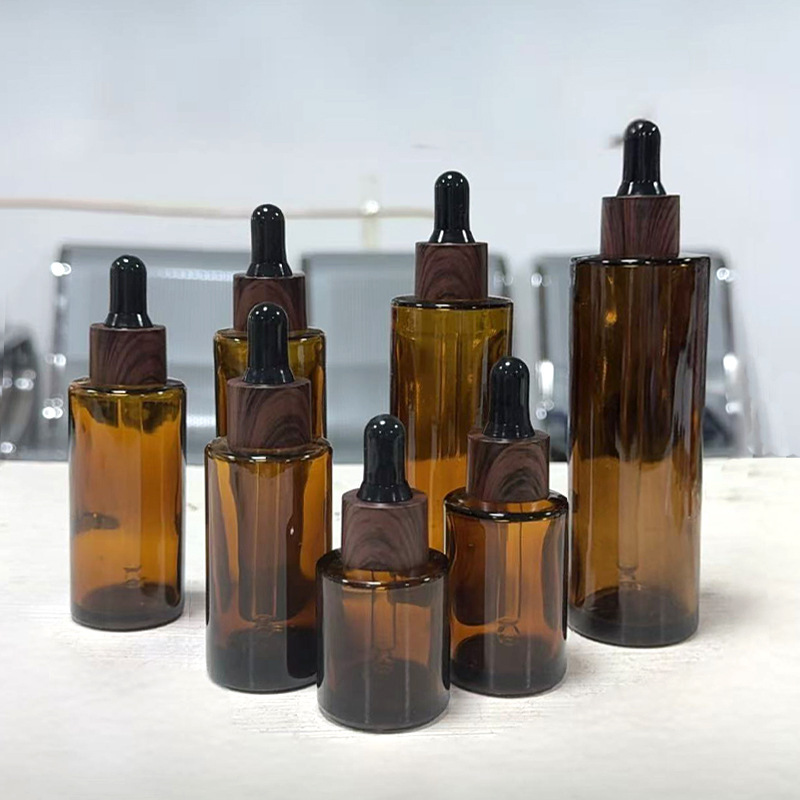 厂家批发现货茶色玻璃避光平肩圆柱滴管瓶山茶油精华分装瓶|undefined