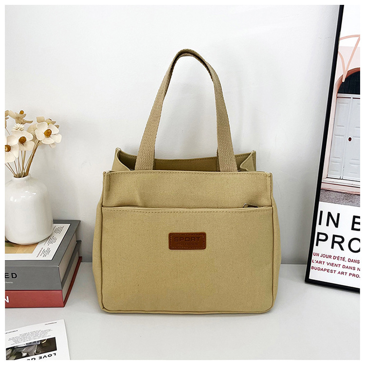 New wholesale fashionable and high-quality canvas handbag, simple and portable, easy to carry for going out, versatile lunch box and bento bag undefined