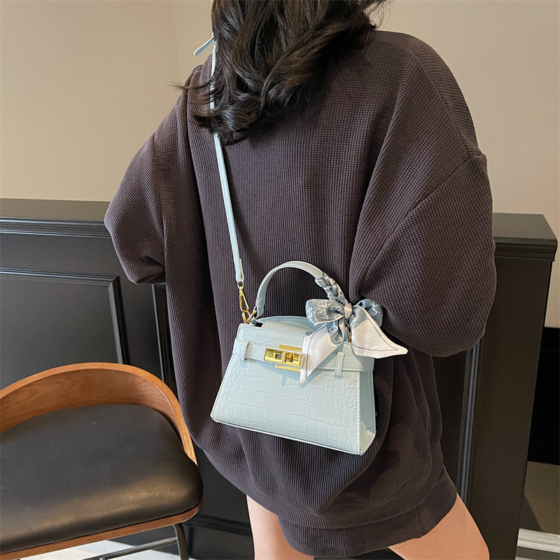 Bolso de mano para mujeres 2026 nueva moda primavera exquisita bolsa de hombro universal bolso de transporte diario image 9
