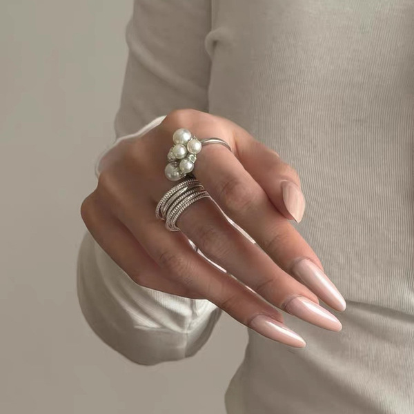 Small design ring with stone pearl with zircon