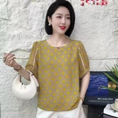 ドロップシッピングラウンドネックプリント半袖 Tシャツ女性のための 2025 夏の新しい薄いルーズスリムママトップ
