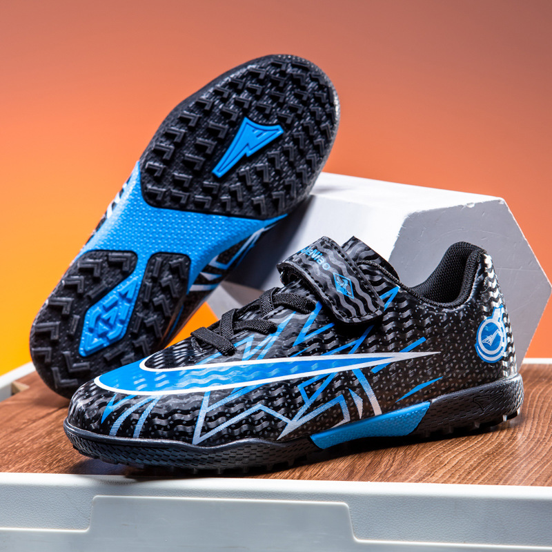 Zapatos de fútbol transfronterizos de alto perfil para hombres TF zapatos de entrenamiento antideslizante transpirables para niños zapatos deportivos profesionales para estudiantes