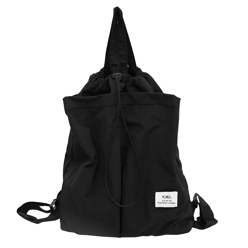 2024 nueva mochila anti-salpicaduras de nailon japonés de nicho, mochila ligera para estudiantes universitarios, mochila de gran capacidad