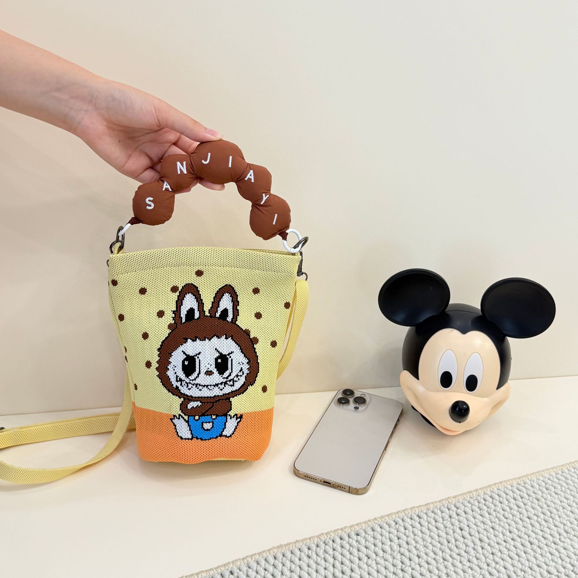 2026 primavera y verano nuevo bolso de cubo de pintura creativo portátil gran espacio de aire de dopamina alta sensación mochila