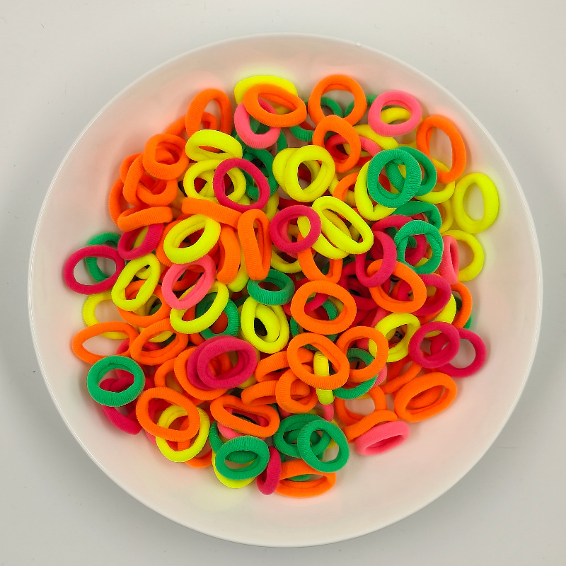 Color de caramelo de alta elasticidad pequeña toalla anillo de cabello bebé anillo de cabello no daña cabello atado fábrica de cabello al por mayor