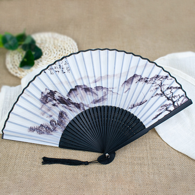 Ventilador plegable de estilo artístico pequeña tinta fresca Ventilador plegable de carácter chino hombres y mujeres ventilador de pareja sin corazón pequeño ventilador de 6 pulgadas para hombres pequeños al por mayor