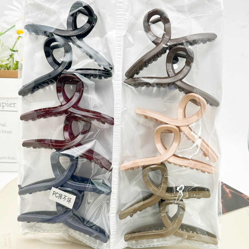 Pearl twist hair clip with plastic embellishment women's Korean side clip Korean style individually packaged pastoral two-yuan store accessories
