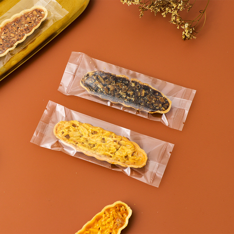 Clásico tipo barco de arroz glutinoso embalaje rectangular máquina de hornear bolsa de sellado en stock fábrica al por mayor bolsa de embalaje de piruletas