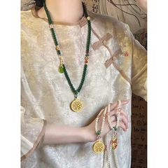 新中国式のレトロな丸いブランドのビーズのネックレスの女性の馬のスカートの漢服のチャイナドレスの毛のチェーンの古風な民族の風のアクセサリー