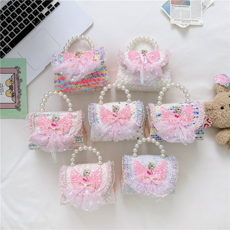 Nuevo bolso infantil, bolso de moda, bolso de princesa, bolso de niña encantador, bolso de mochila para bebés en línea, popularidad