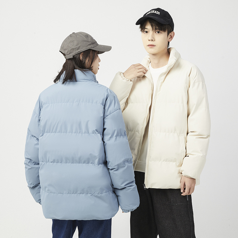 Algodón de color sólido para hombres 2024 nueva ropa de algodón de invierno pareja coreana chaqueta de pan de algodón chaqueta de invierno ligera al por mayor